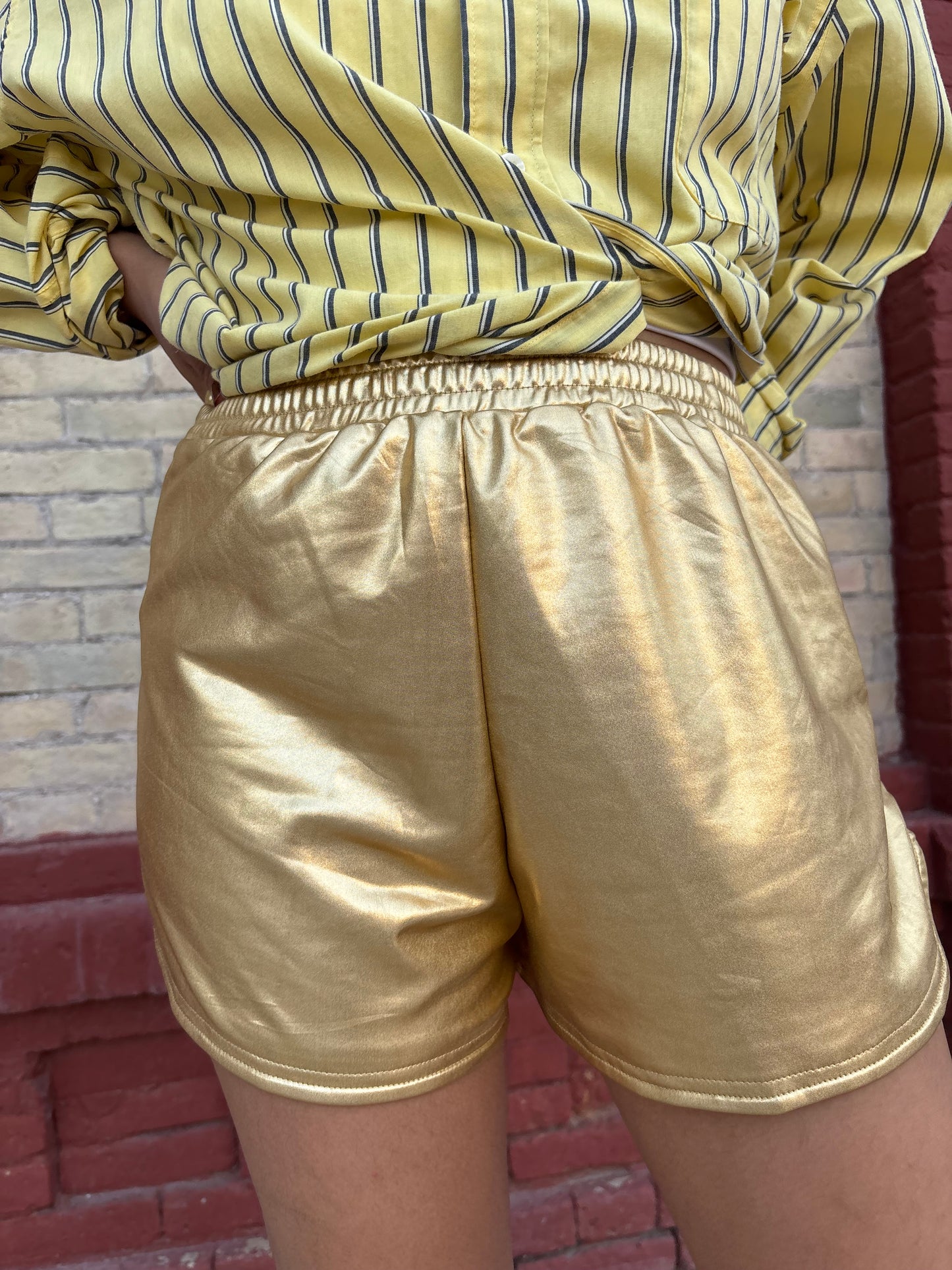 Short metálico